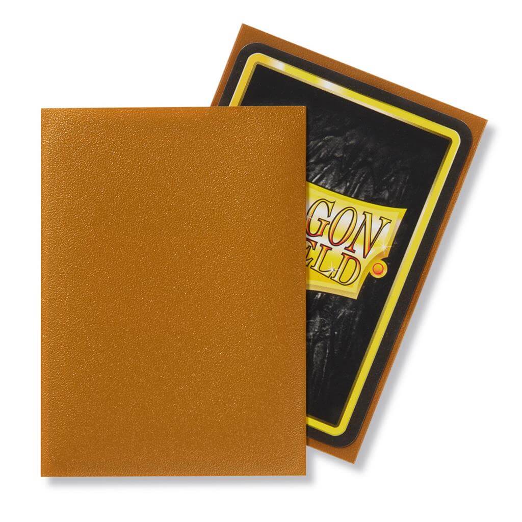 Accessoires Transparante voorkant en matte gouden achterkant. Een box bevat 100 sleeves. Ontworpen voor gebruik met Magic: The Gathering ™, Pokémon ™ en andere kaartspellen.