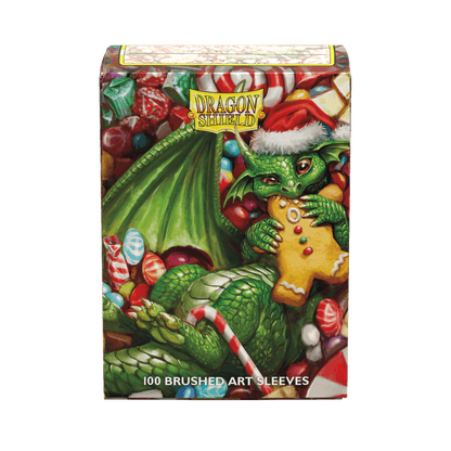 Accessoires The 2024 Dragon Shield Christmas Brushed Art sleeves feature mischevious dragons endulging in seasonal sweets. Brushed Art sleeves feature a lightly textured back and provide a steady shuffle-feel as you face off against your opponents. Art sl
