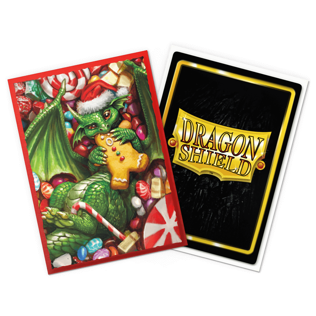 The 2024 Dragon Shield Christmas Brushed Art sleeves feature mischevious dragons endulging in seasonal sweets. Brushed Art sleeves feature a lightly textured back and provide a steady shuffle-feel as you face off against your opponents. Art sleeves are pr